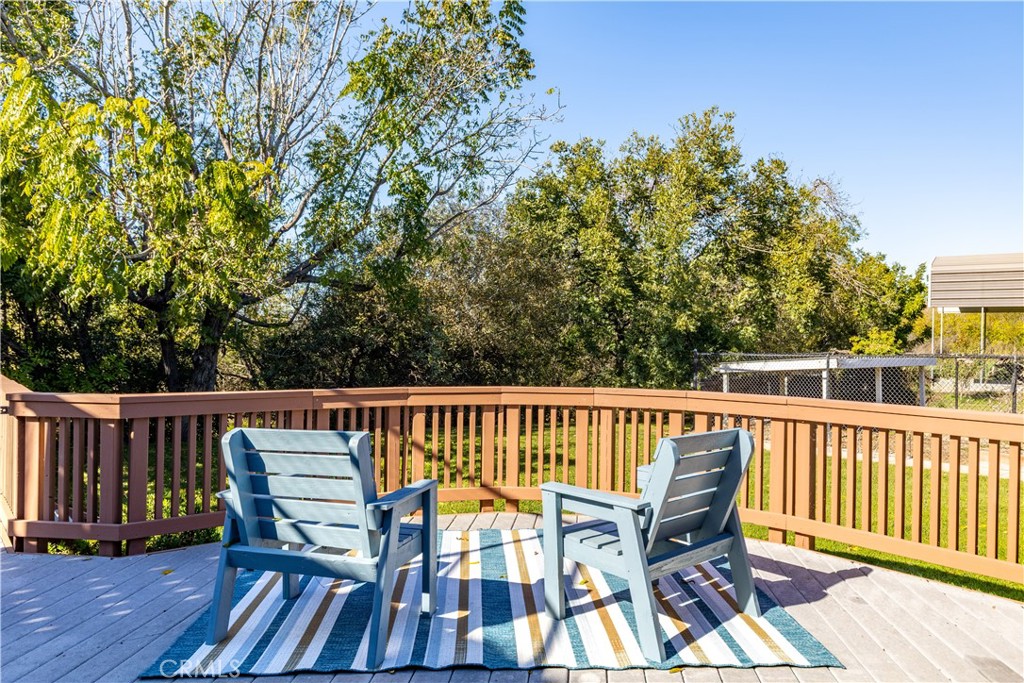 4375 Rustic Way San Luis Obispo, CA 93401 - Photo 54 of 65 a view of a chair and table on the wooden floor