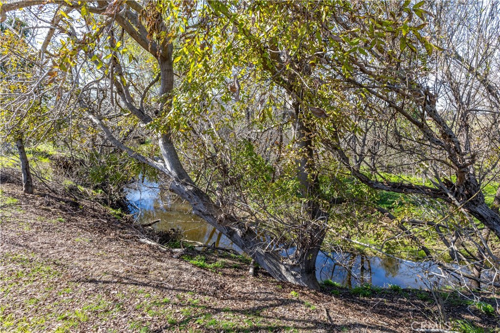 4375 Rustic Way San Luis Obispo, CA 93401 - Photo 55 of 65 a backyard of a house with lots of green space
