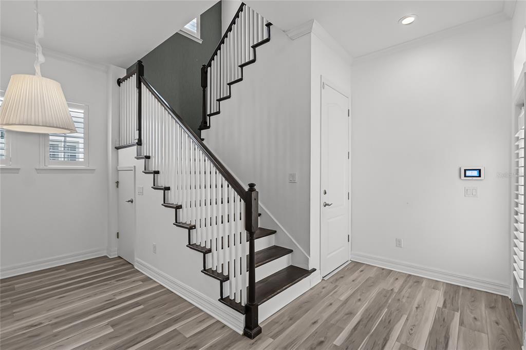 1515 Resolute Street Celebration, FL 34747 - Photo 19 of 56 a view of entryway with wooden floor