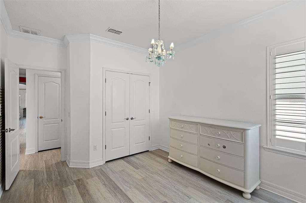 1515 Resolute Street Celebration, FL 34747 - Photo 30 of 56 a view of a room with wooden floors and window