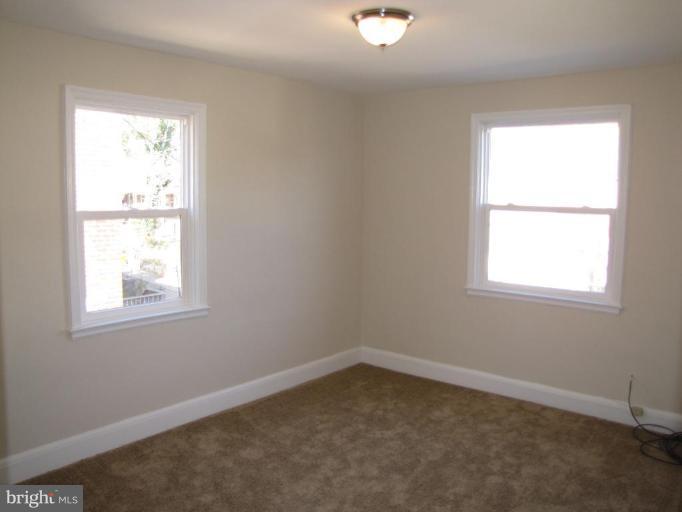 5152 Stafford Road Baltimore, MD 21229 - Photo 11 of 22 an empty room with a window