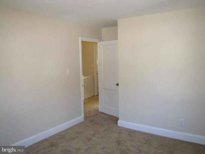 5152 Stafford Road Baltimore, MD 21229 - Photo 12 of 22 a view of an empty room