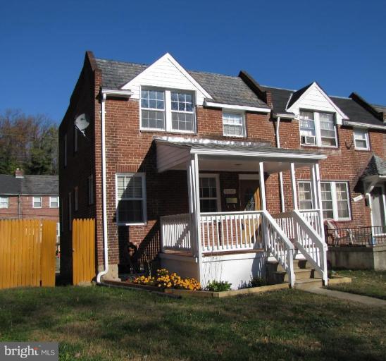 5152 Stafford Road Baltimore, MD 21229 - Photo 21 of 22 a front view of a house with a yard