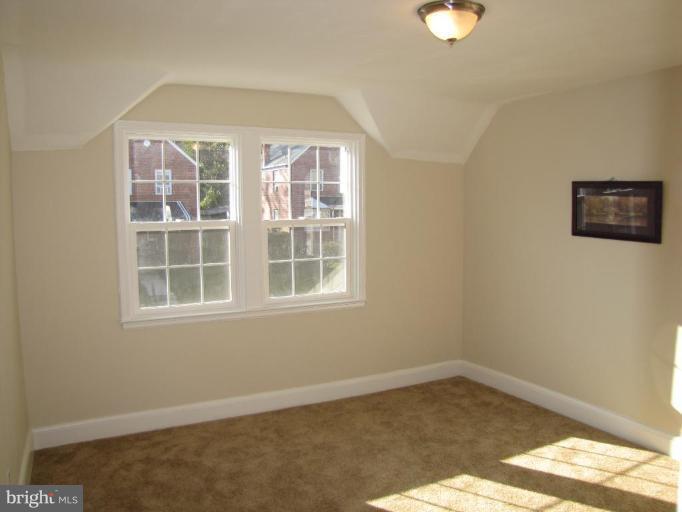 5152 Stafford Road Baltimore, MD 21229 - Photo 9 of 22 an empty room with a window