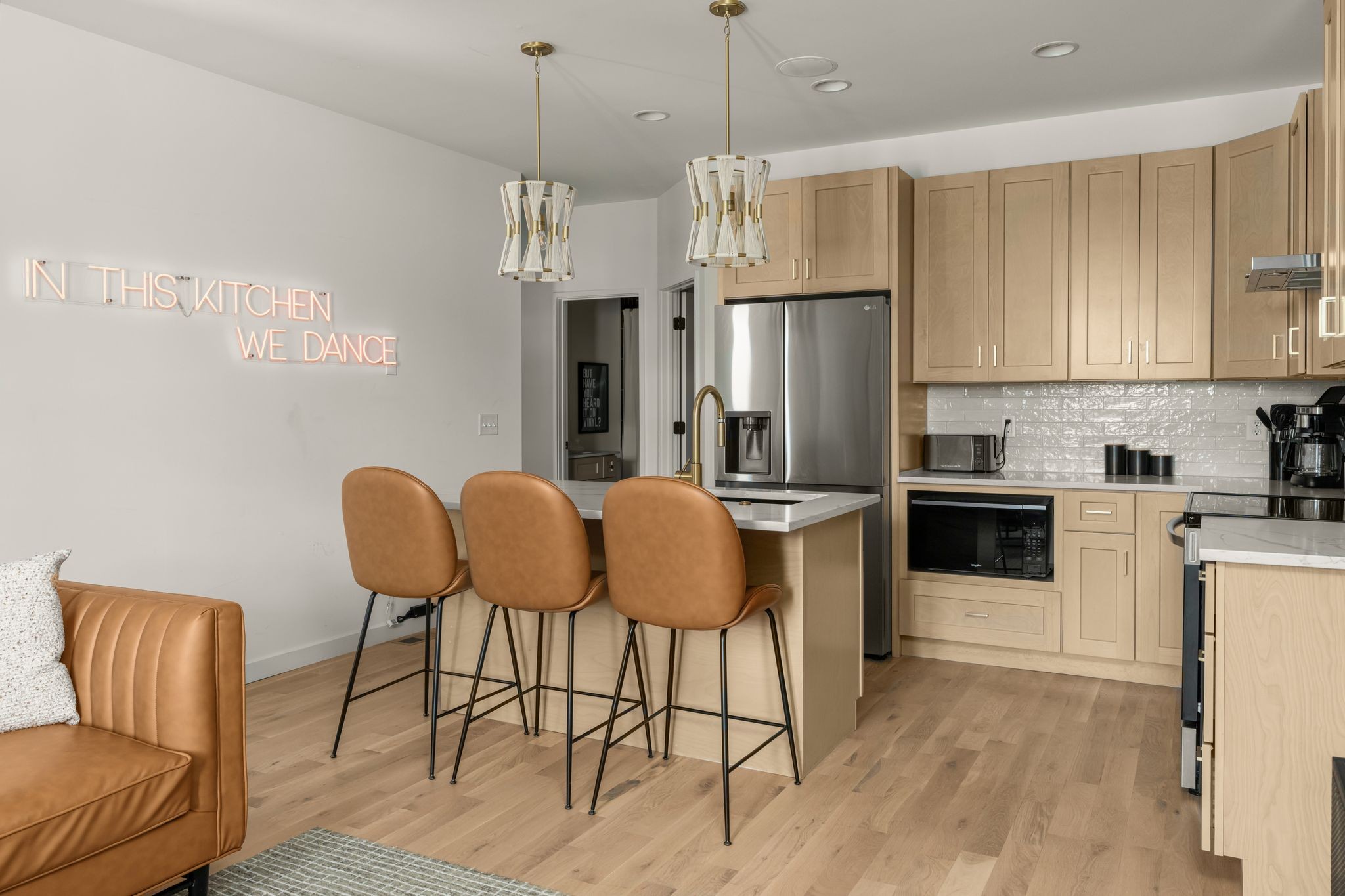 2000 South Hamilton Road, Unit 2 Nashville, TN 37218 - Photo 15 of 43 a kitchen with stainless steel appliances granite countertop a refrigerator a stove a sink dishwasher with a dining table and chairs