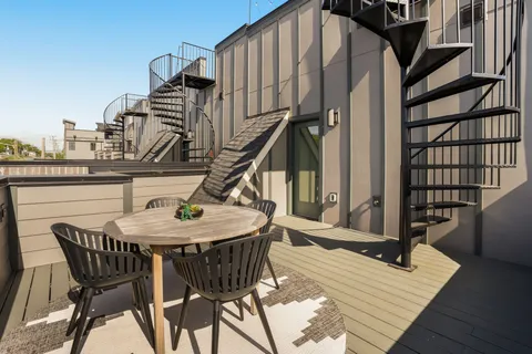 a view of a dinning tables and chairs in the patio