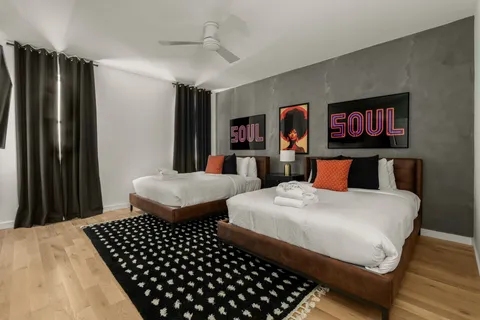 a bedroom with bed and a walk in closet