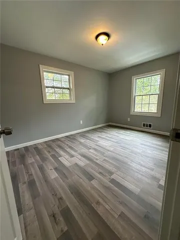 an empty room with windows
