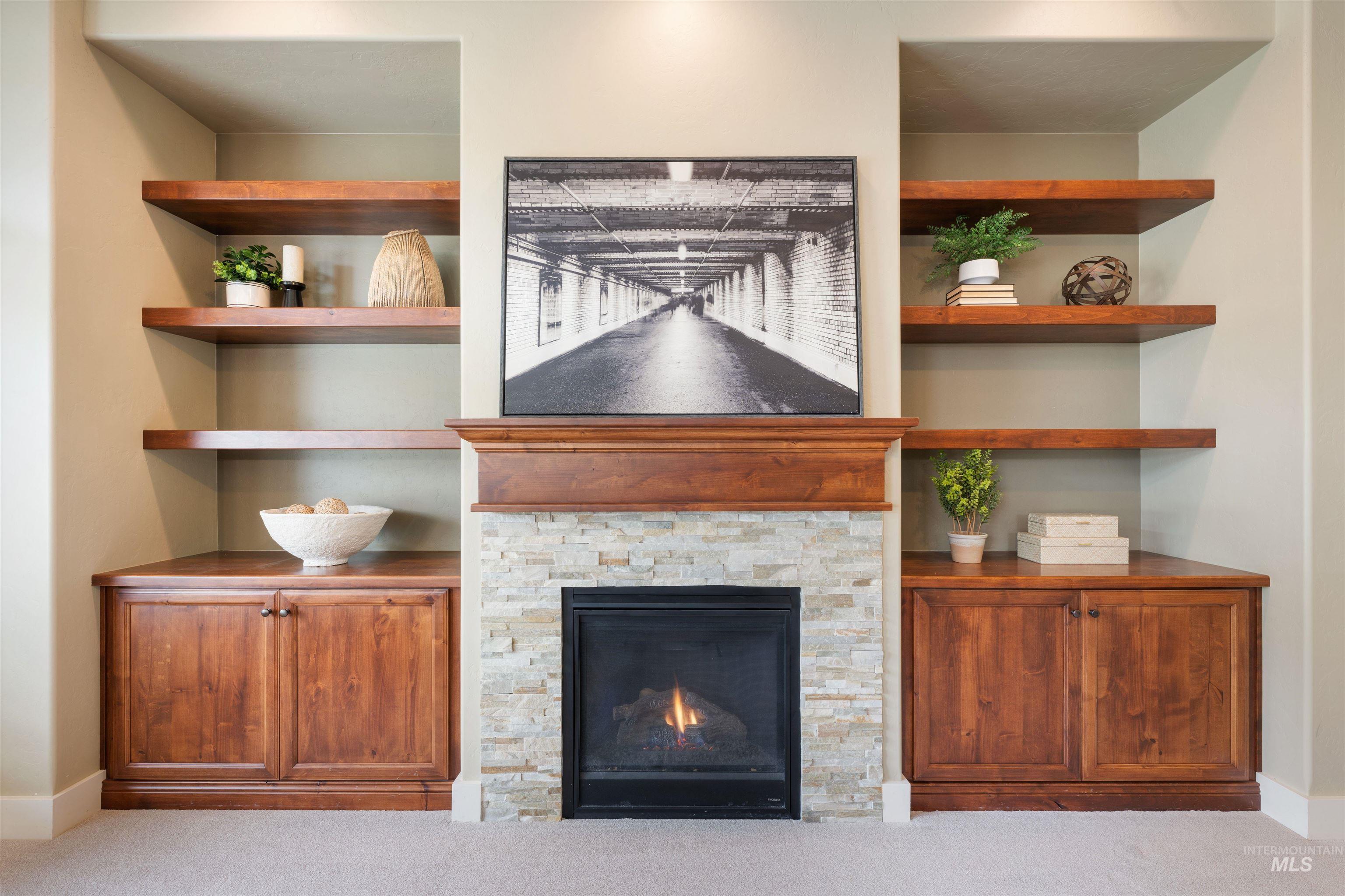 13571 Signorello Street Caldwell, ID 83607 - Photo 10 of 34 Gas fireplace, built in cabinetry