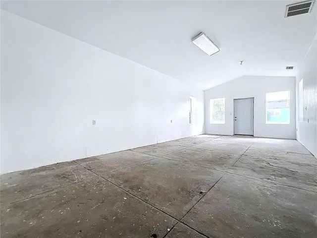 a view of an empty room with window