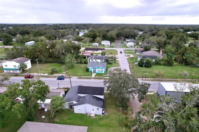 a view of a garden with houses