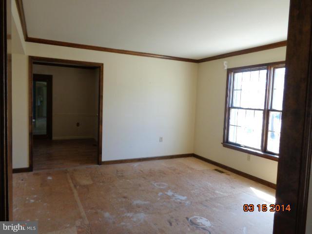 8069 Stone Ridge Drive Frederick, MD 21702 - Photo 7 of 13 an empty room with windows and closet