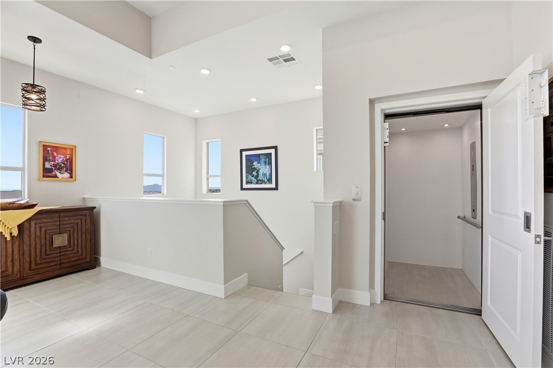 4159 Solace Street, Unit 2 Las Vegas, NV 89135 - Photo 8 of 71 Entrance to the home from top of stairs and as exiting the elevator.