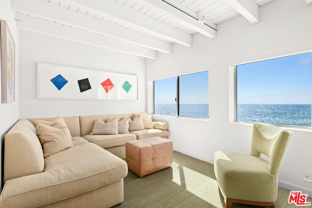 24254 Malibu Road Malibu, CA 90265 - Photo 19 of 26 a living room with furniture and wall painting