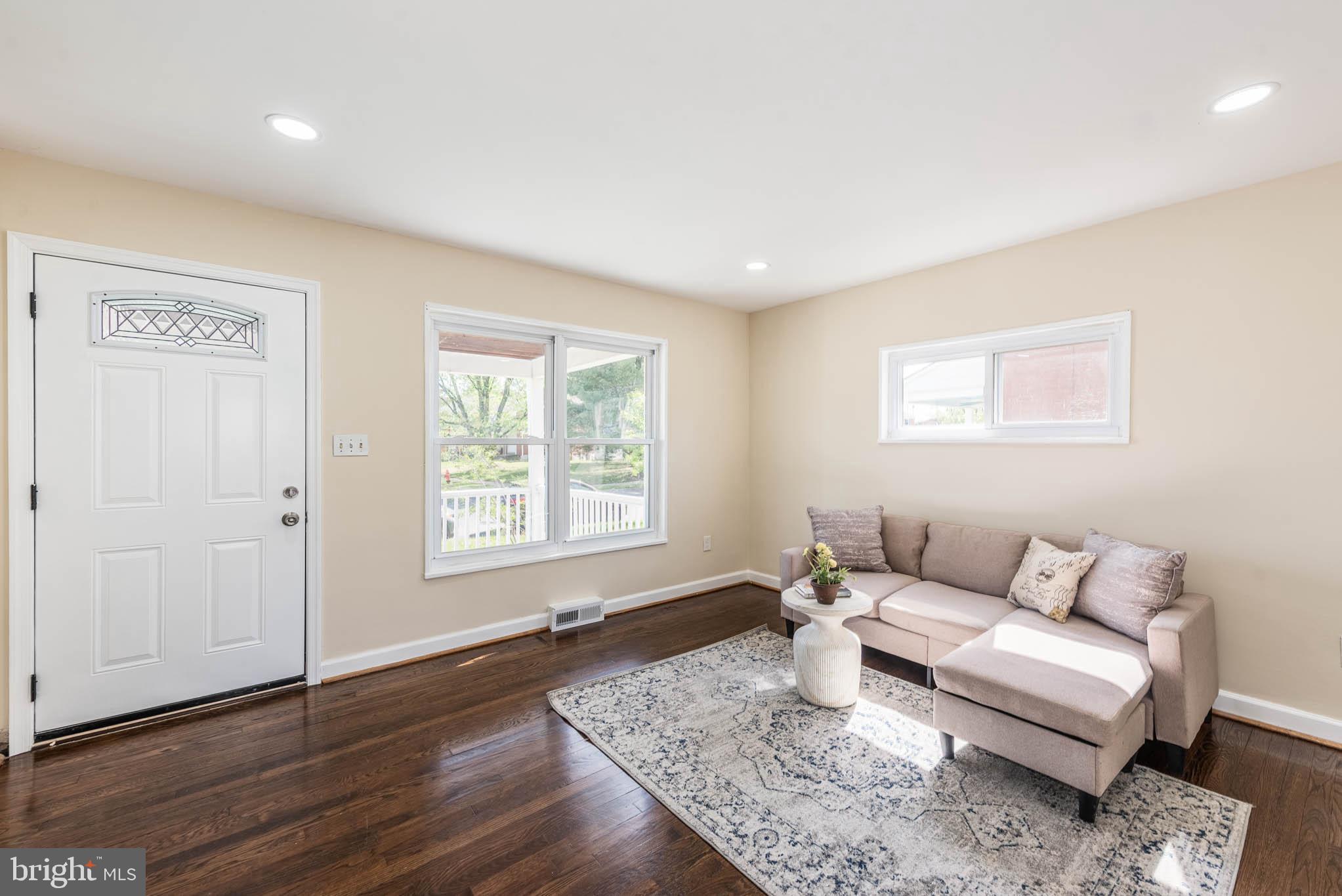 3300 Wallford Drive Baltimore, MD 21222 - Photo 2 of 31 a living room with furniture and a window