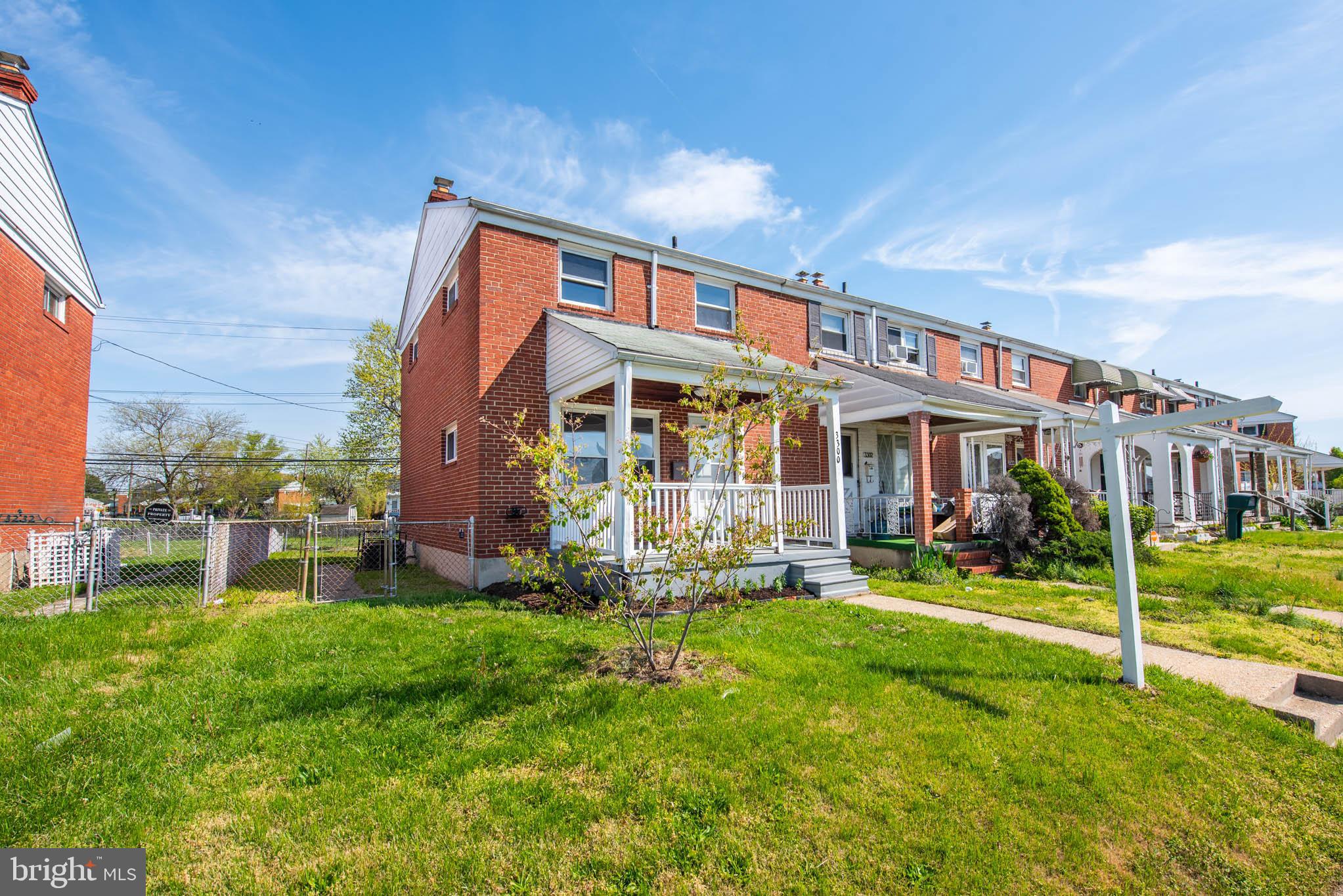 3300 Wallford Drive Baltimore, MD 21222 - Photo 27 of 31 a view of a building with a yard