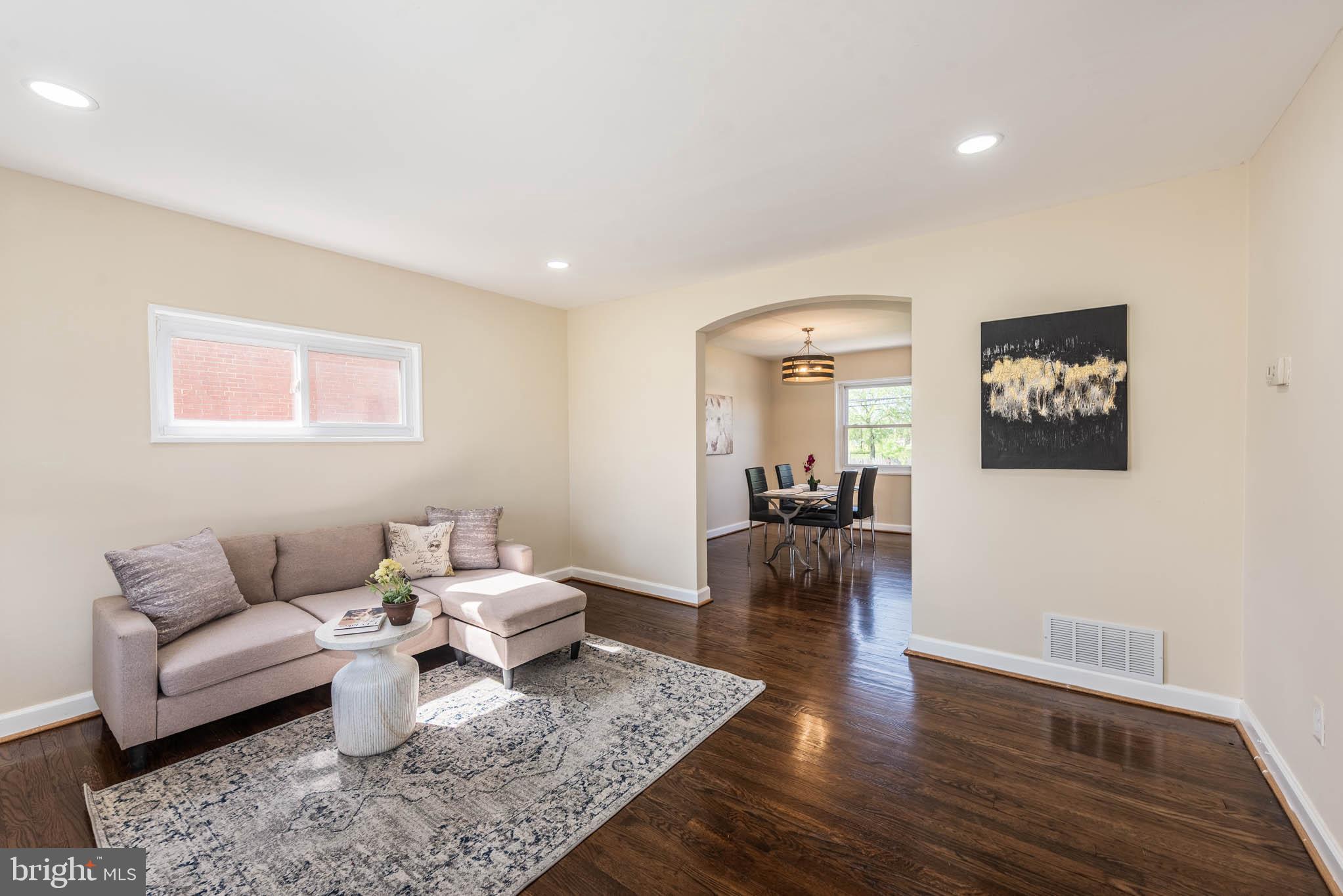 3300 Wallford Drive Baltimore, MD 21222 - Photo 3 of 31 a living room with furniture and wooden floor