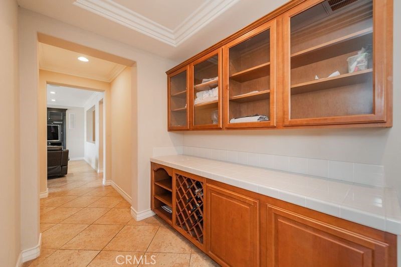 2148 Sageleaf Circle Corona, CA 92882 - Photo 12 of 41 a hallway with a sink and a washing machine