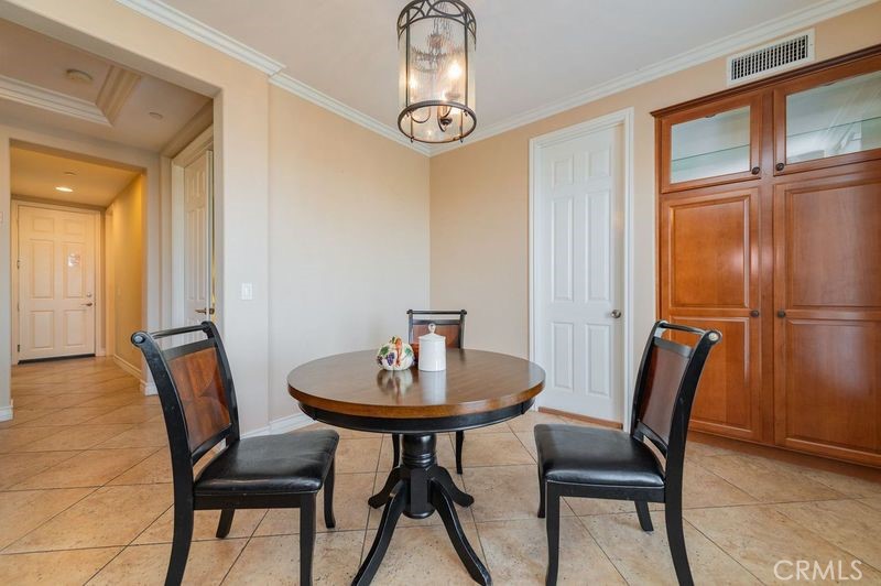 2148 Sageleaf Circle Corona, CA 92882 - Photo 13 of 41 a view of a dining room with furniture
