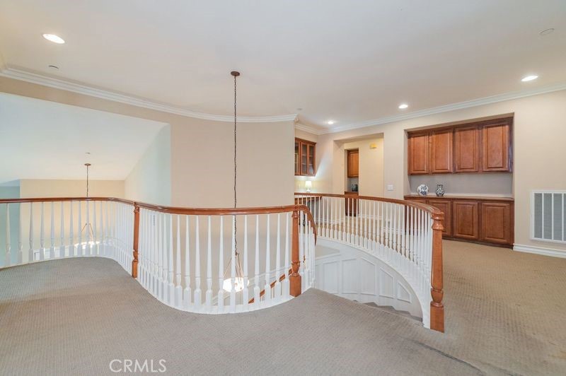 2148 Sageleaf Circle Corona, CA 92882 - Photo 16 of 41 a view of a hallway with seating area