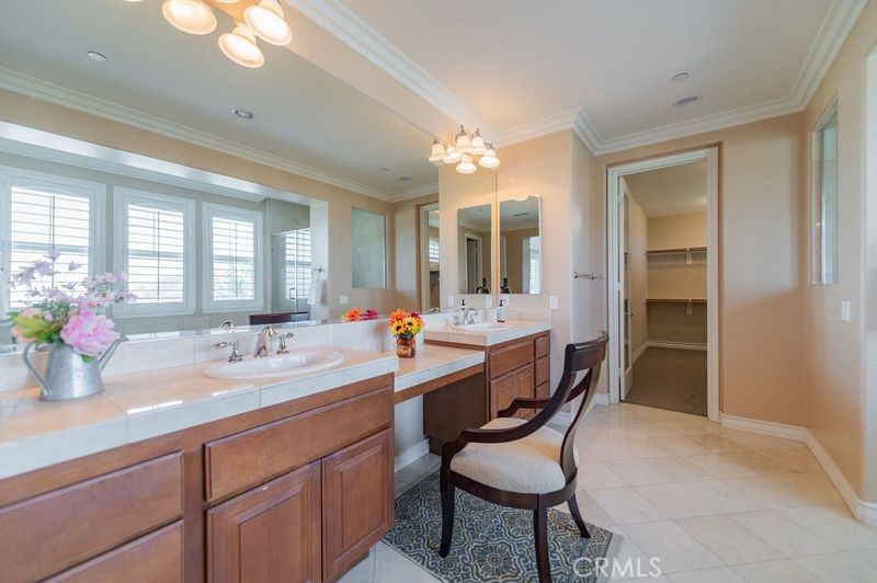 2148 Sageleaf Circle Corona, CA 92882 - Photo 17 of 41 a dining hall with a sink and breakfast area