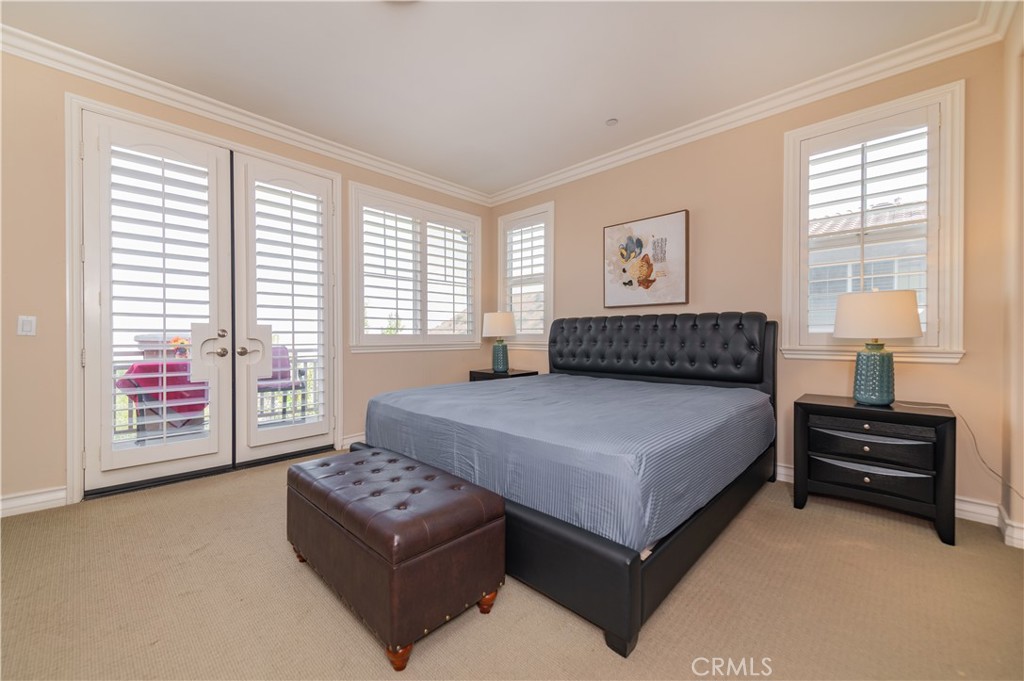 2148 Sageleaf Circle Corona, CA 92882 - Photo 21 of 41 a bedroom with a bed window and a night stand