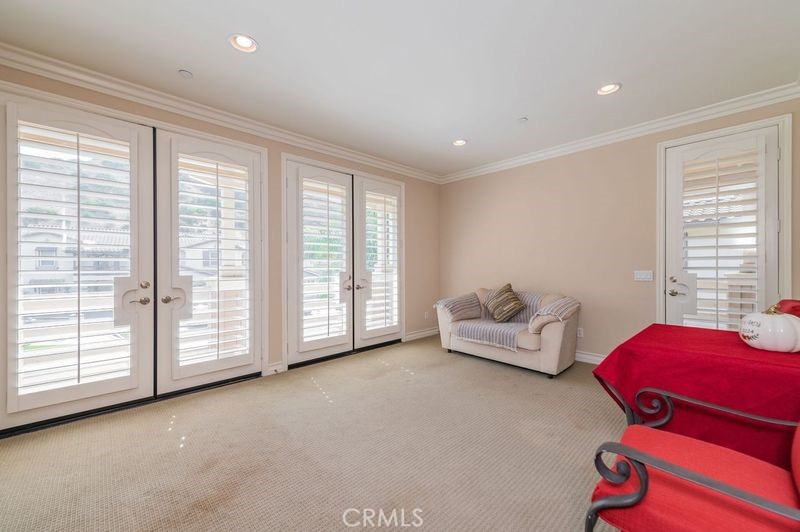 2148 Sageleaf Circle Corona, CA 92882 - Photo 24 of 41 a bedroom with furniture and a large window