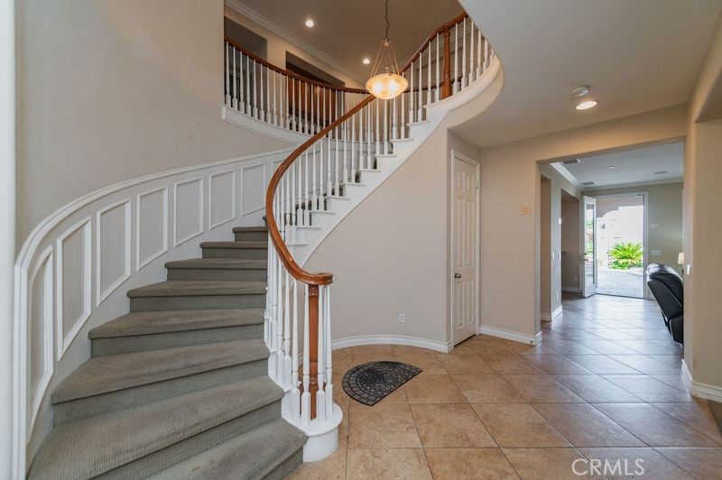 2148 Sageleaf Circle Corona, CA 92882 - Photo 33 of 41 a view of entryway and hall with wooden floor