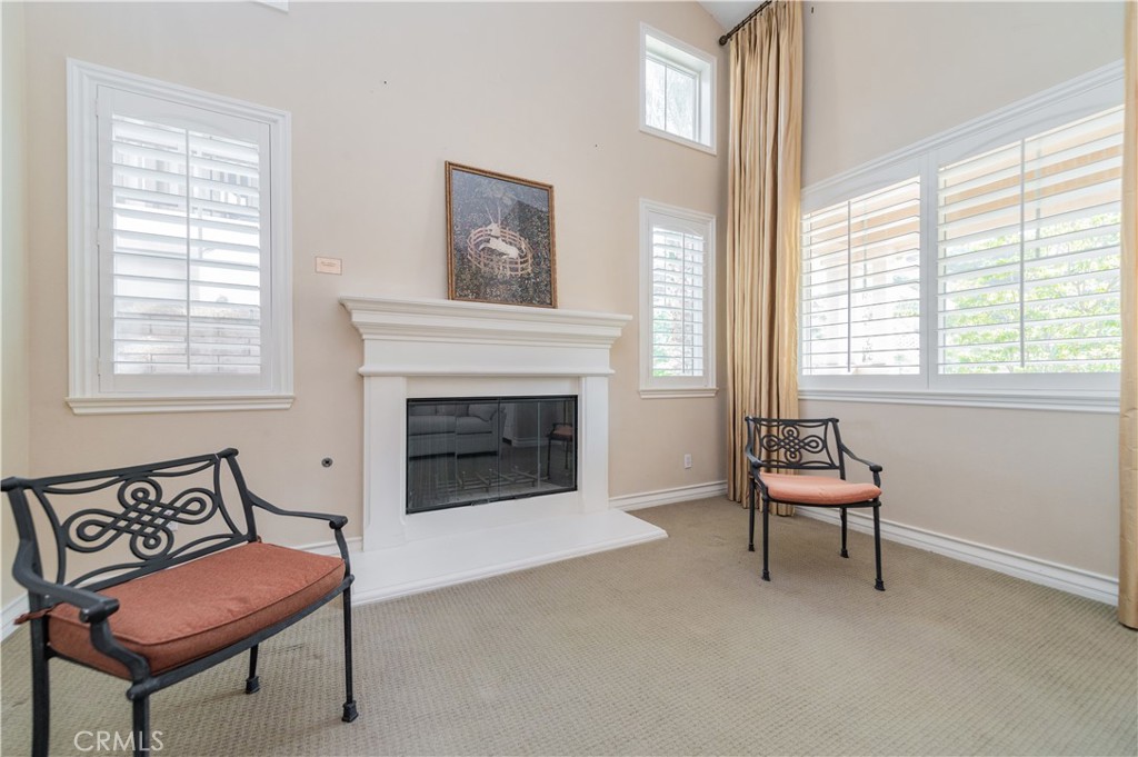 2148 Sageleaf Circle Corona, CA 92882 - Photo 5 of 41 a living room with furniture and a fireplace