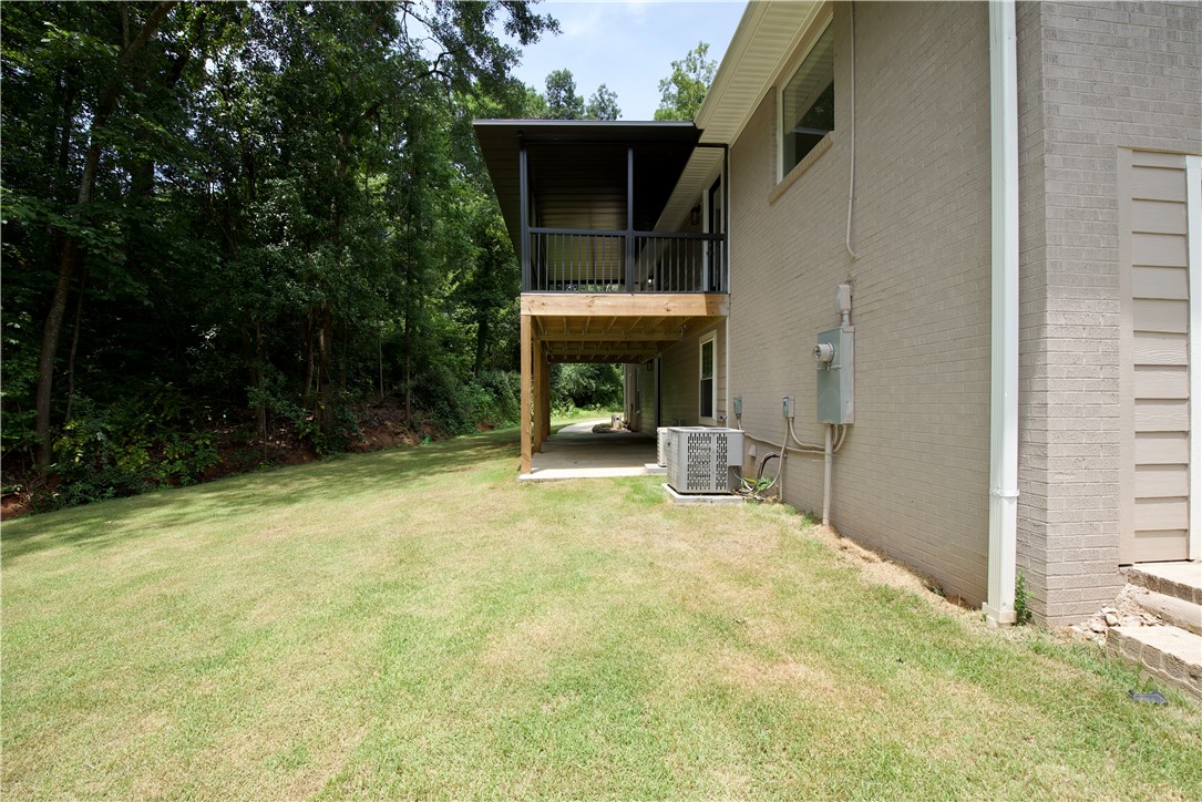 317 Pendleton Road Clemson, SC 29631 - Photo 9 of 36 A spacious backyard with mature trees provides a natural, private setting.