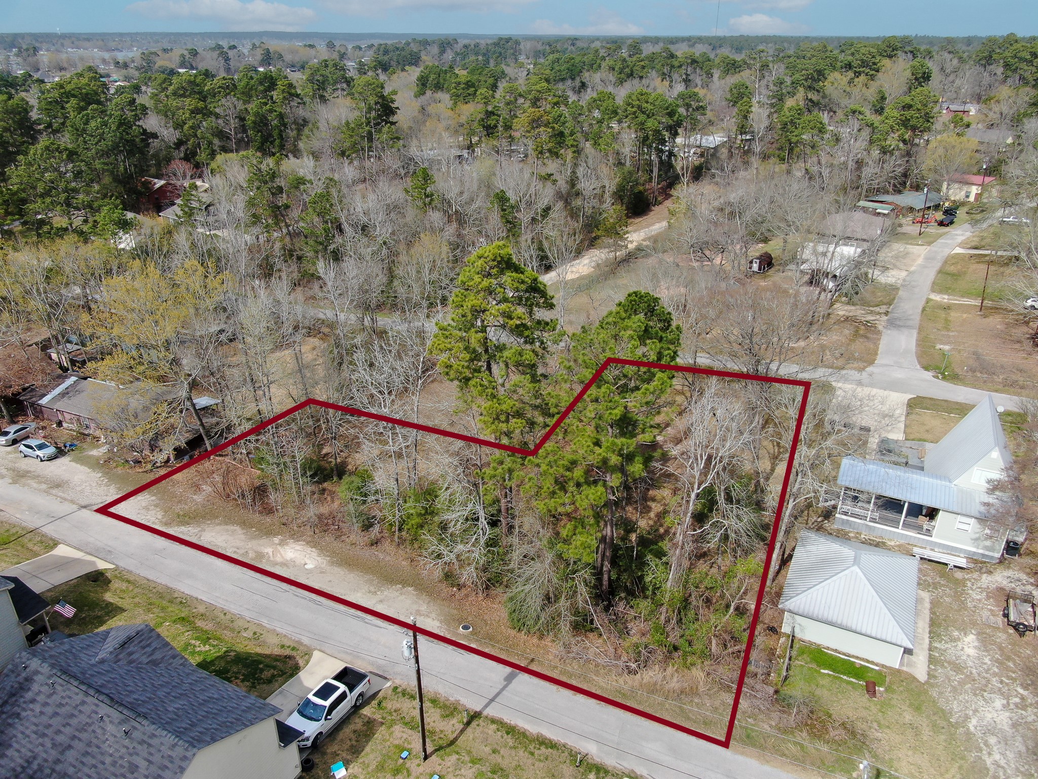 Tbd Cedar Point Livingston, TX 77351 - Photo 16 of 23 a view of a garden with a bench