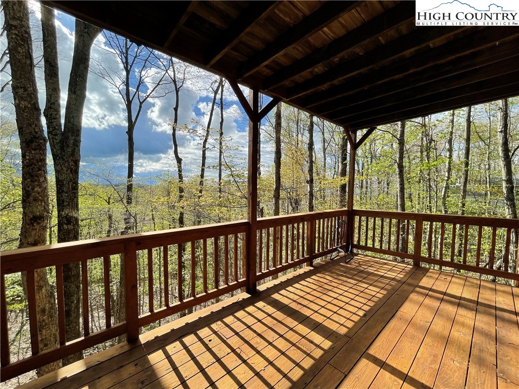 407 Pine Ridge Road Beech Mountain, NC 28604 - Photo 30 of 31 a view of balcony with wooden floor