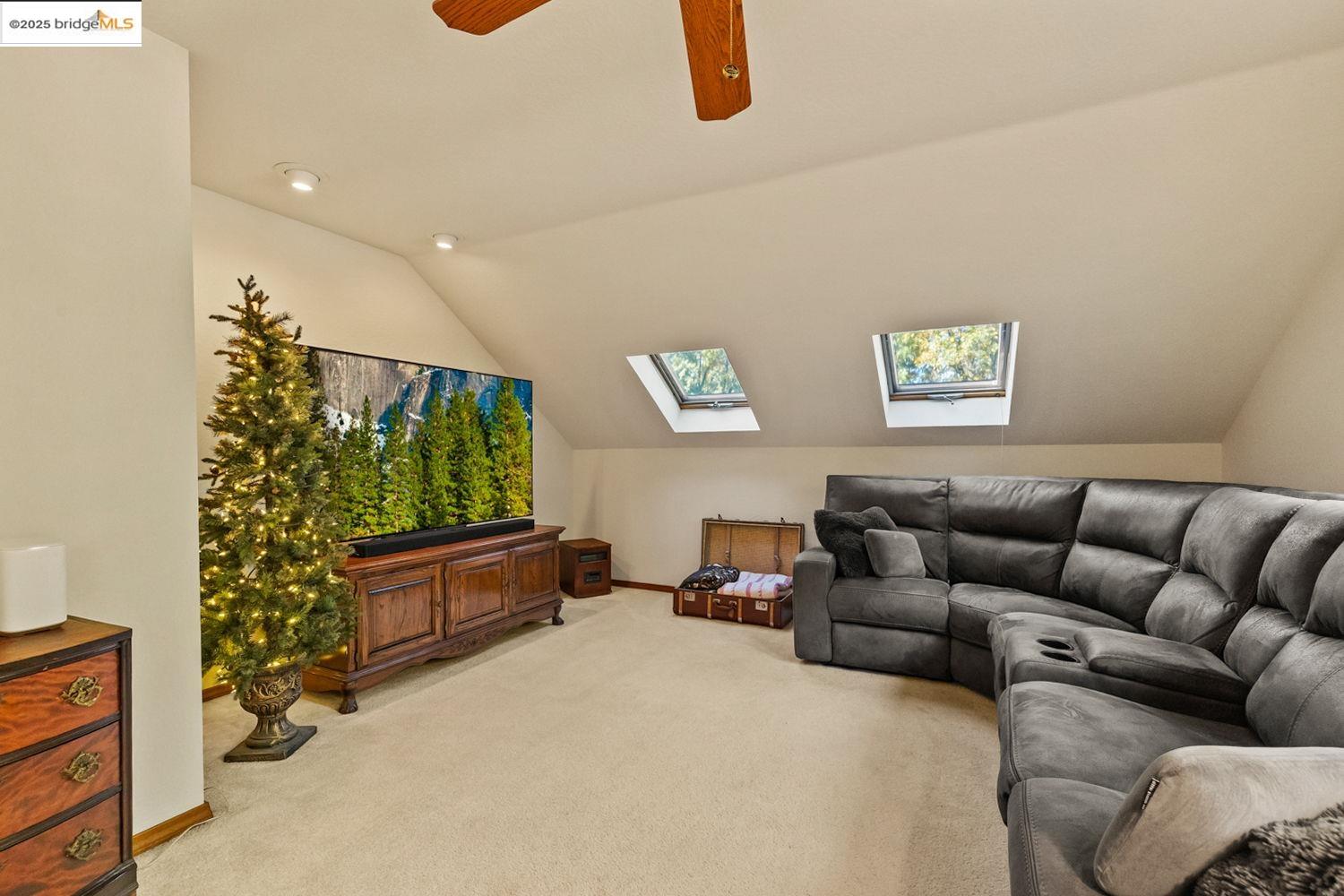 24181 Awahanee Road Sonora, CA 95370 - Photo 21 of 48 a living room with furniture and a window