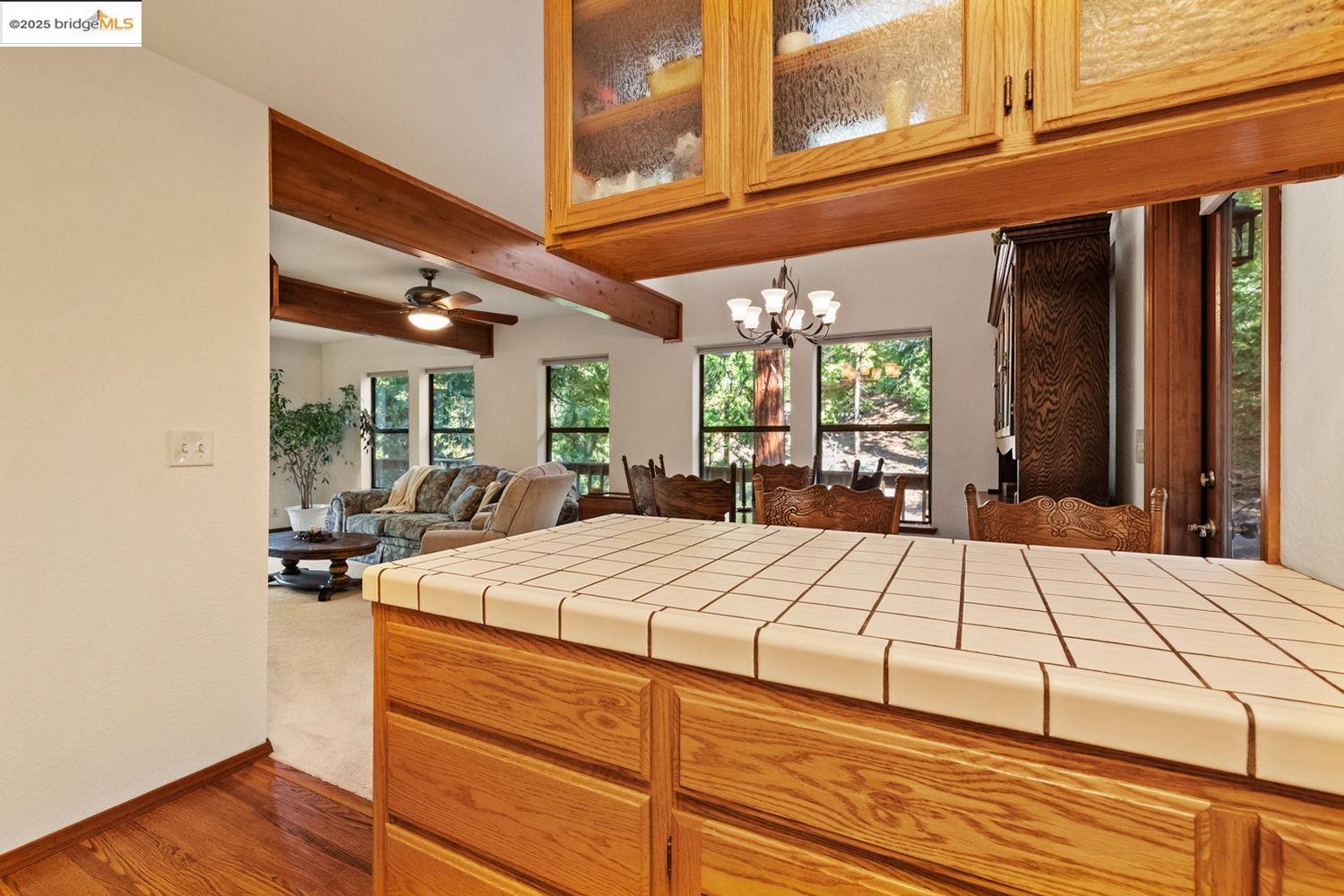 24181 Awahanee Road Sonora, CA 95370 - Photo 28 of 48 a bed sitting in a spacious bedroom next to a window