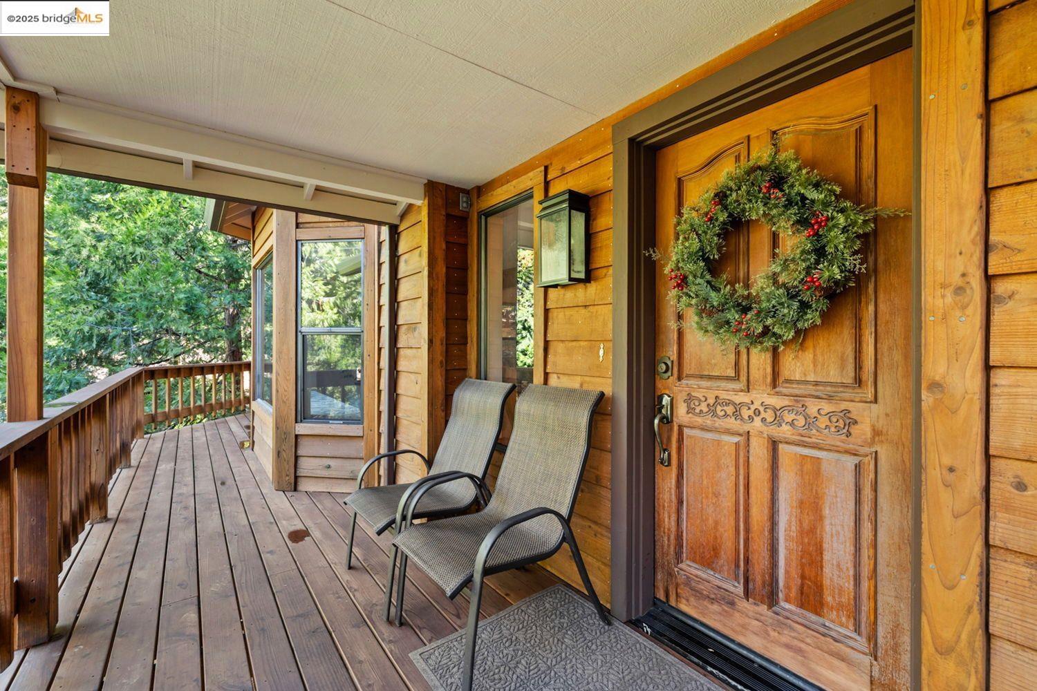 24181 Awahanee Road Sonora, CA 95370 - Photo 7 of 48 a view of a two chairs in the balcony