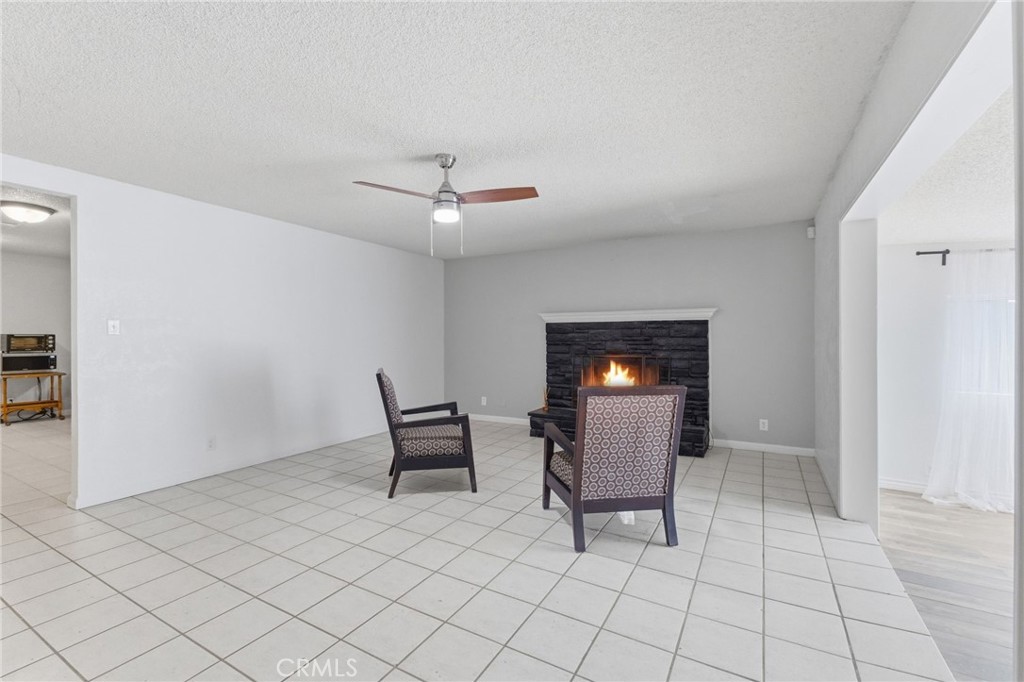 96 West Repplier Road Banning, CA 92220 - Photo 15 of 53 Woodburning fireplace - flame digitally added