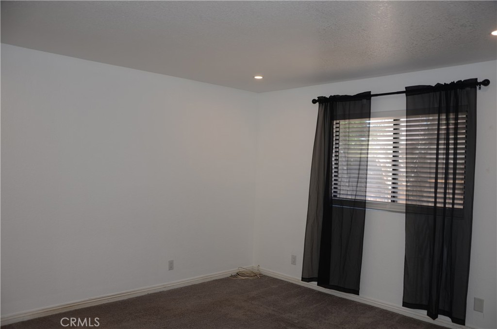 43600 Santa Rosa Circle Lancaster, CA 93535 - Photo 22 of 25 a view of a room with a wooden floor