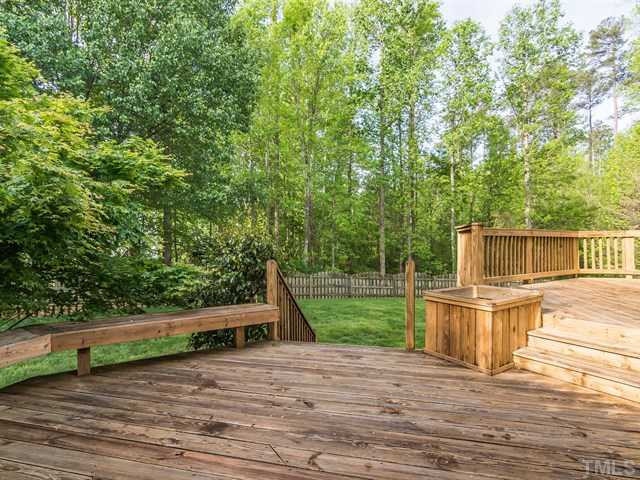 115 Jersey Ridge Road Cary, NC 27518 - Photo 23 of 25 this deck is 40x10 HUGE! Fenced backyard. Back Yard