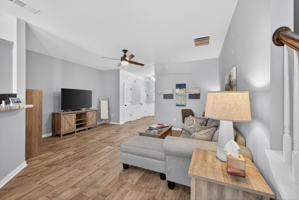 256 Valley Crossing Canton, GA 30114 - Photo 15 of 41 a living room with furniture and a flat screen tv