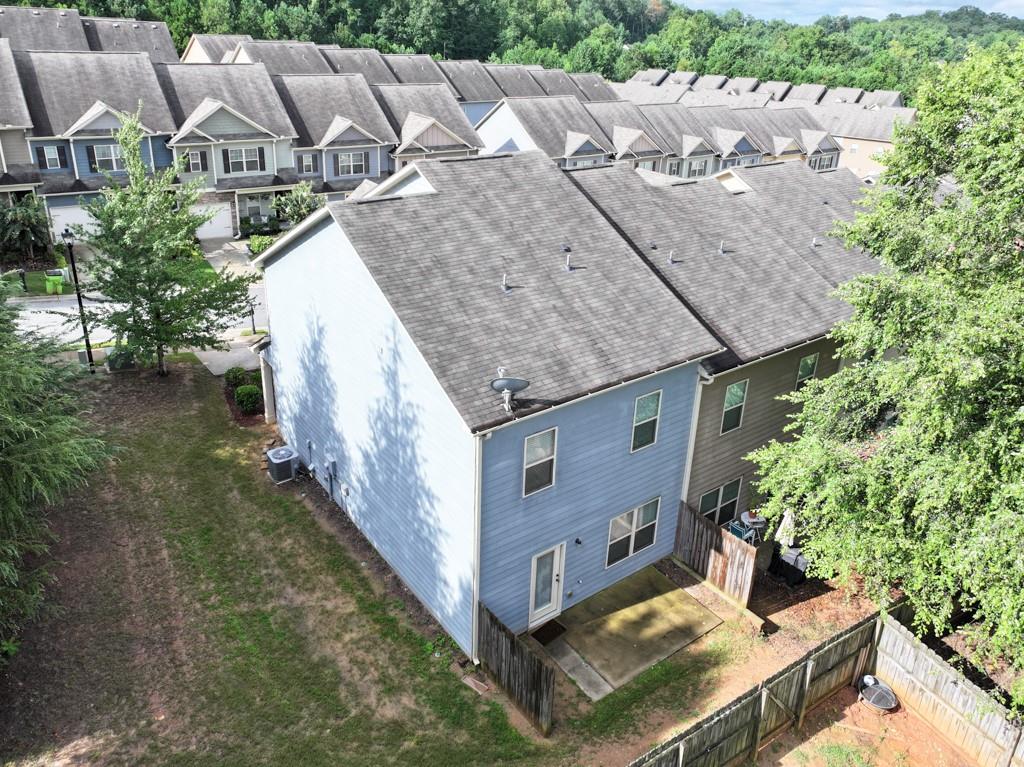 256 Valley Crossing Canton, GA 30114 - Photo 37 of 41 an aerial view of a house with yard