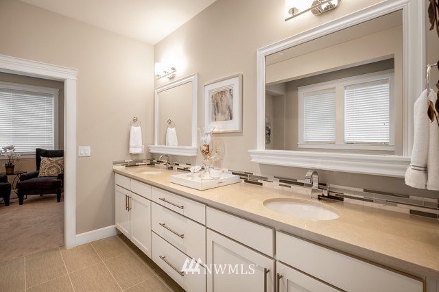 3 233rd Place Southeast Bothell, WA 98021 - Photo 15 of 16 a bathroom with a sink and a mirror