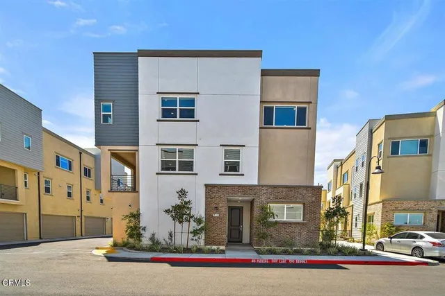 a front view of a building with street view