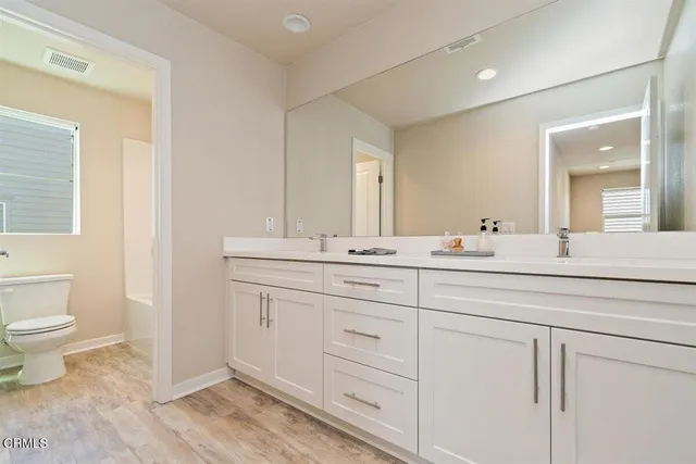 a view of a street with buildings