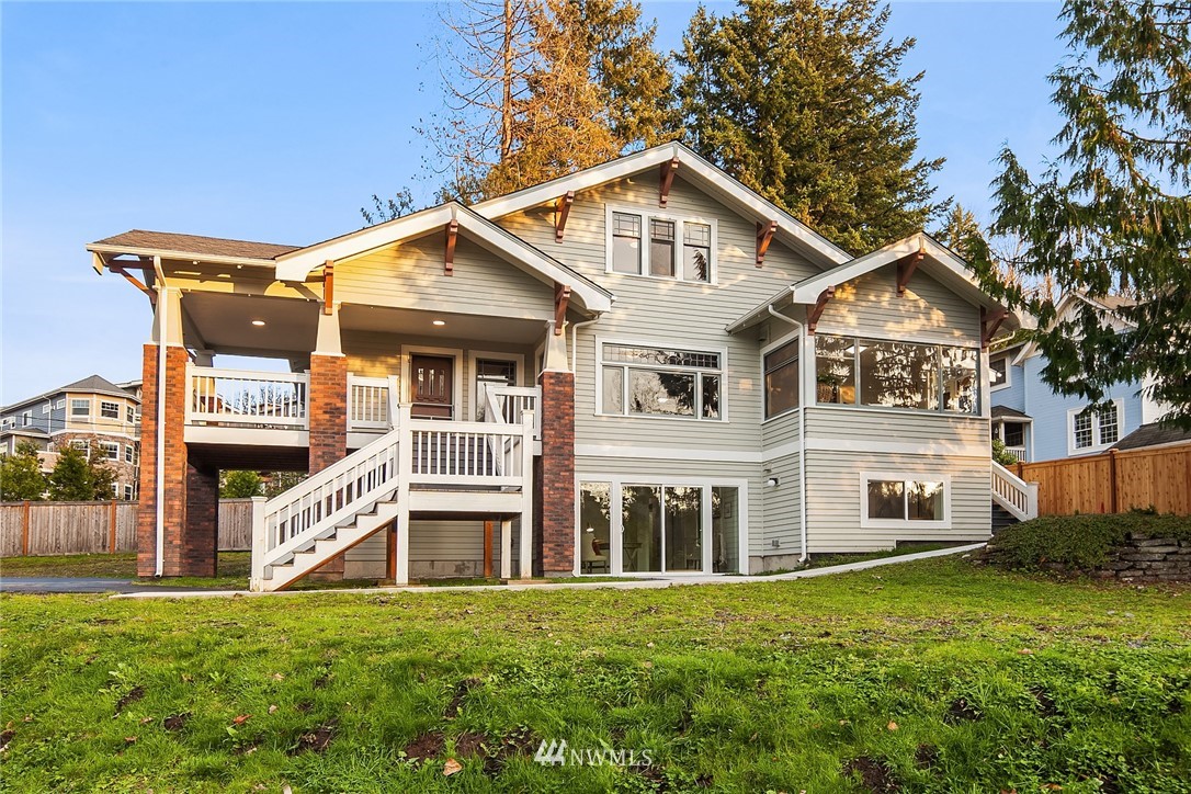 17522 West Riverside Drive Bothell, WA 98011 - Photo 1 of 28 a front view of a house with a garden