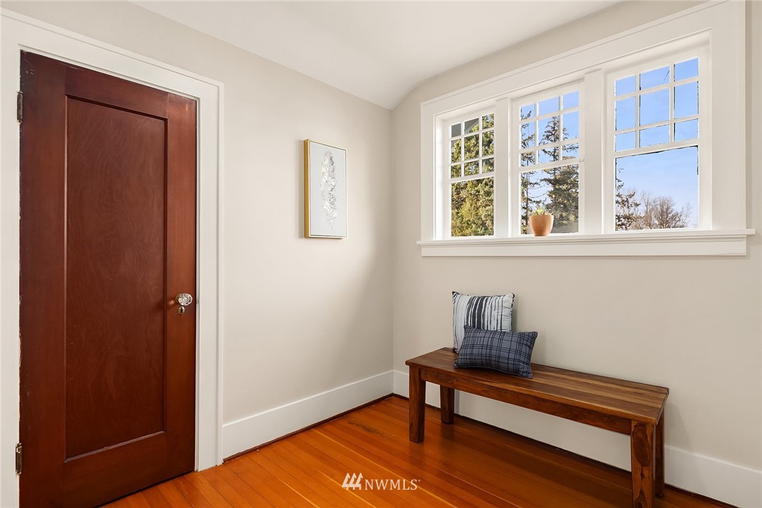 17522 West Riverside Drive Bothell, WA 98011 - Photo 17 of 28 a view of room with window and wooden floor
