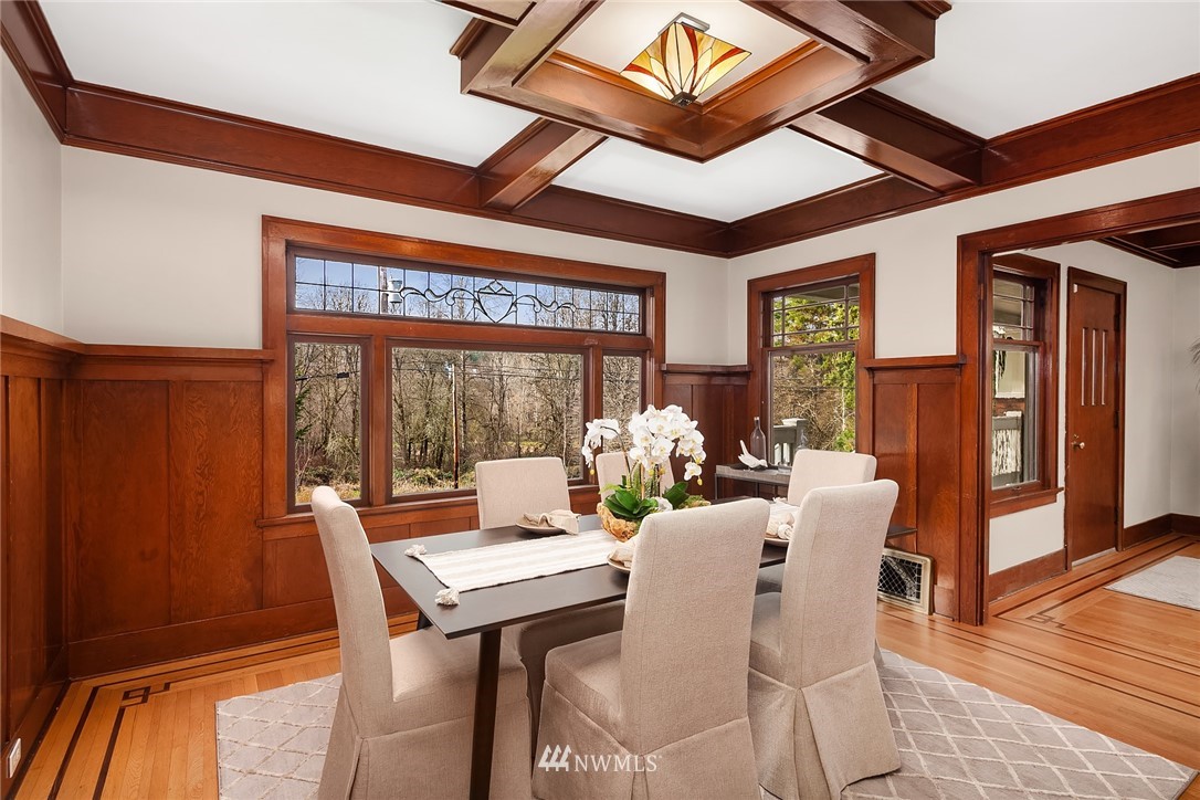 17522 West Riverside Drive Bothell, WA 98011 - Photo 7 of 28 a view of a dining room with furniture window and wooden floor