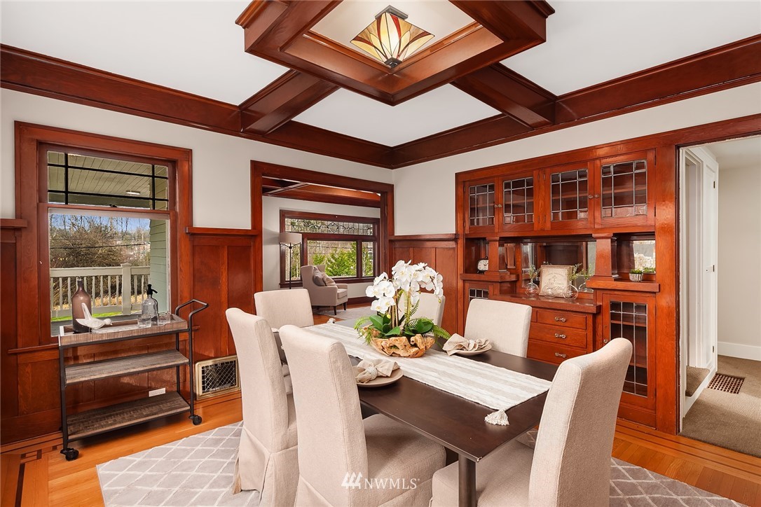 17522 West Riverside Drive Bothell, WA 98011 - Photo 8 of 28 a view of a dining room with furniture window and wooden floor