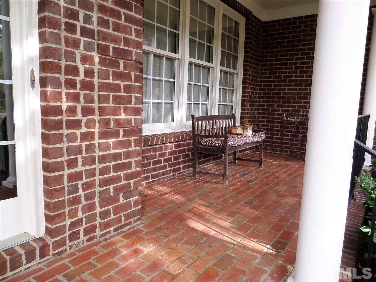 5236 Levering Mill Road Apex, NC 27539 - Photo 2 of 25 Great times ahead on your front porch to welcome, greet, and lounge. Wooded front yard provides privacy.