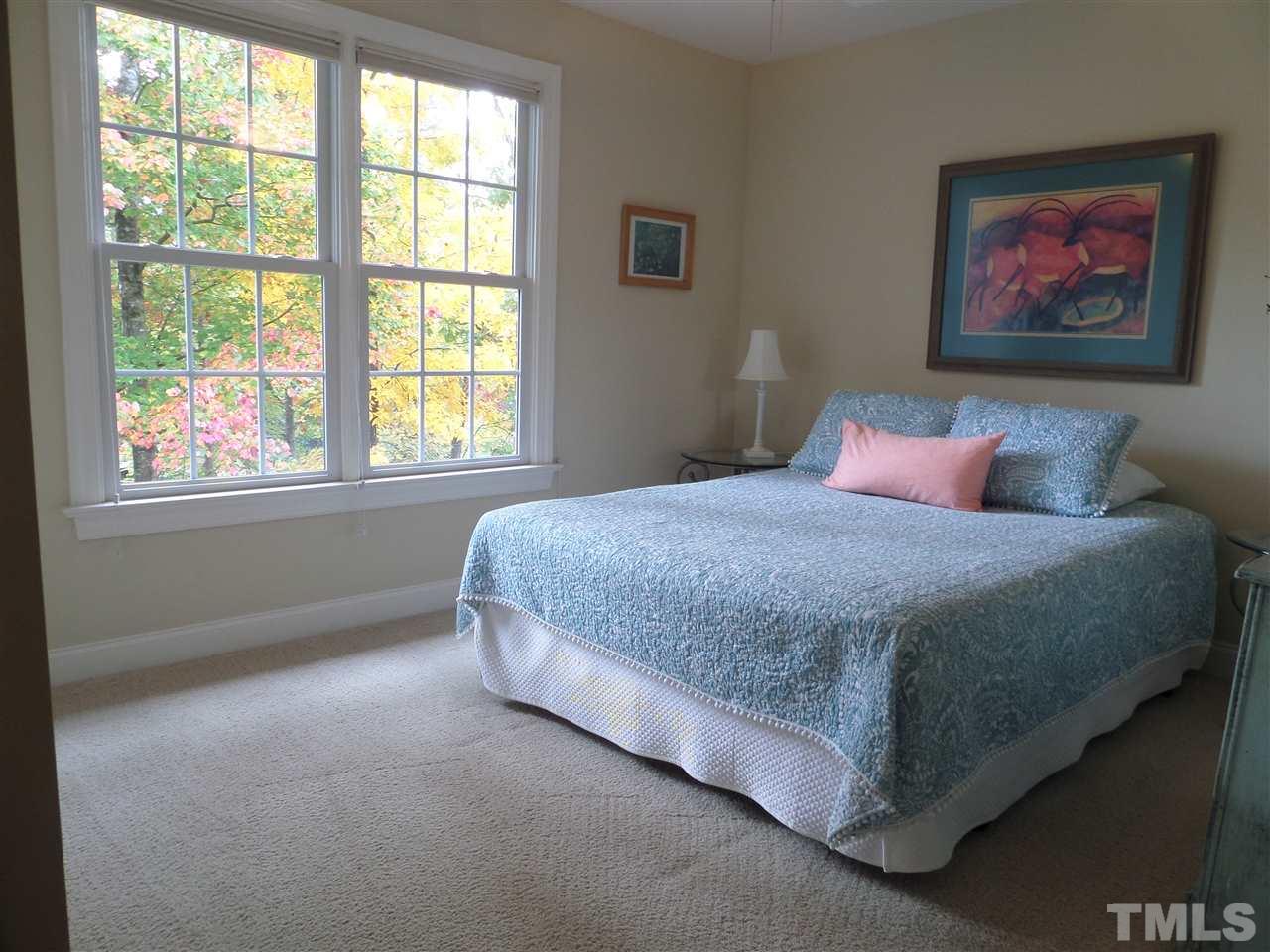 5236 Levering Mill Road Apex, NC 27539 - Photo 16 of 25 Guest Bedroom suite has own bath. Palladium window allows so much light to enjoy.
