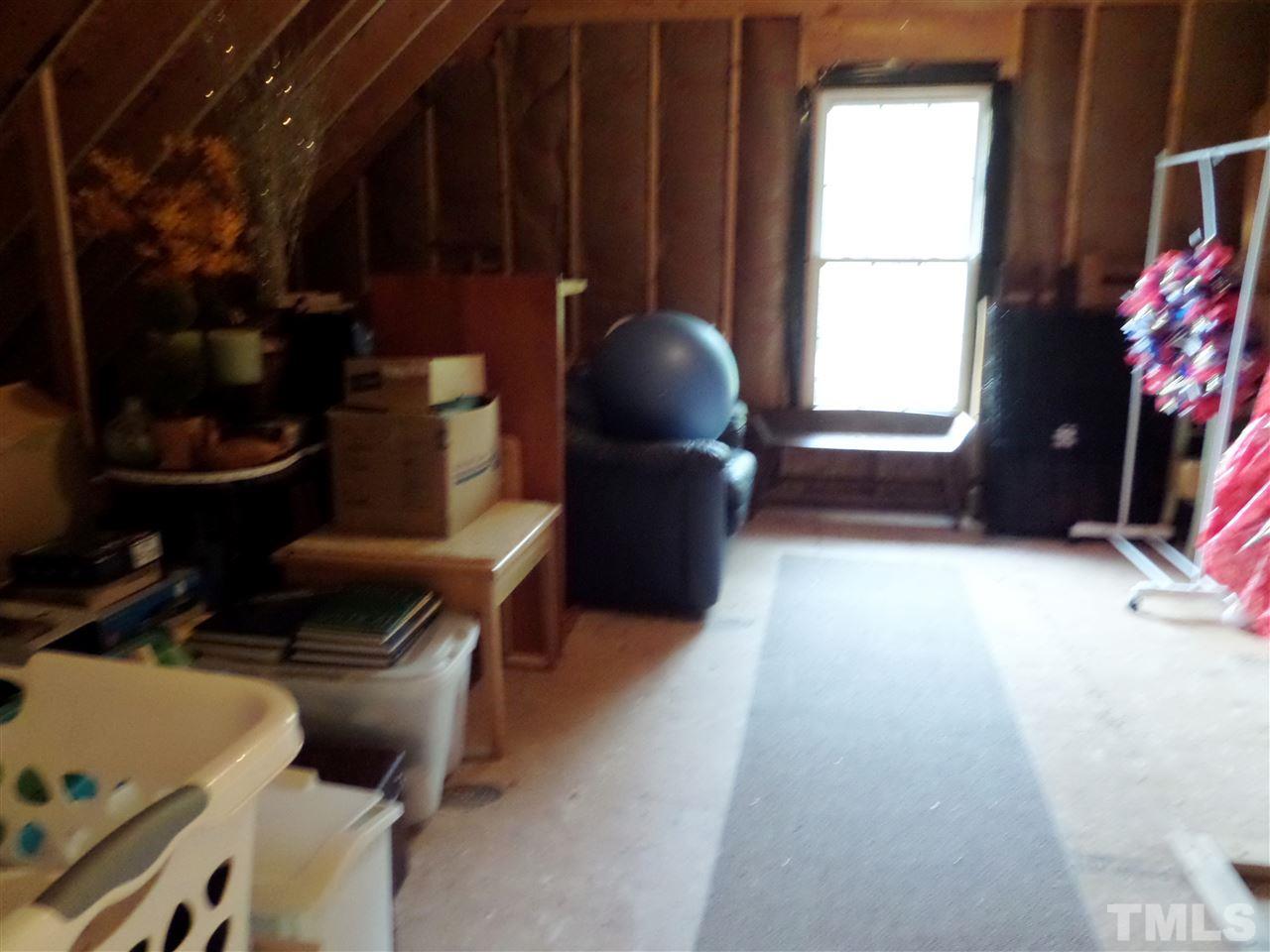 5236 Levering Mill Road Apex, NC 27539 - Photo 22 of 25 This area on the second floor is framed and ready for your ideas. Another flex space or office and has area for another bath. Or just have a great area for all your storage needs in the walk out area!